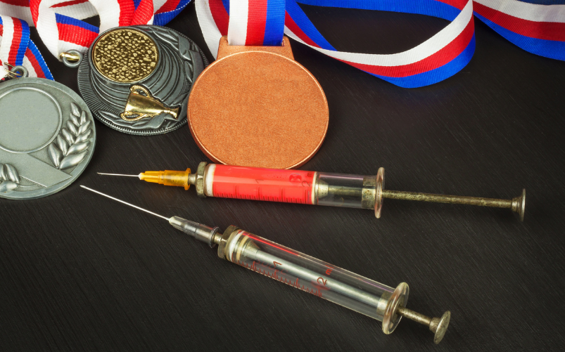 siringhe e medaglie olimpiadi Tokyo 2020